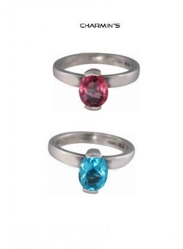 Oval aqua en pink charmins ringen