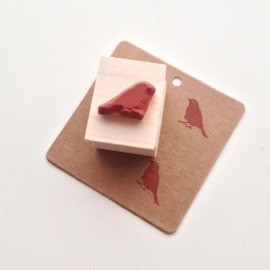 Stempel vogeltje van de krantenkapper